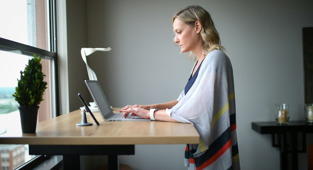 woman meditating at desk