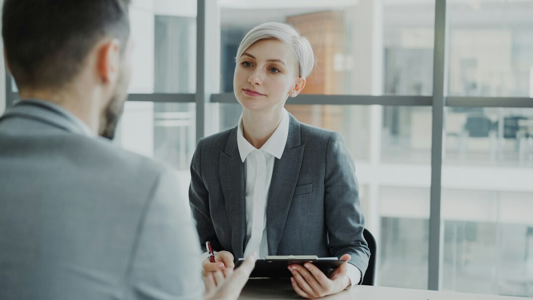 manager discussing with employee